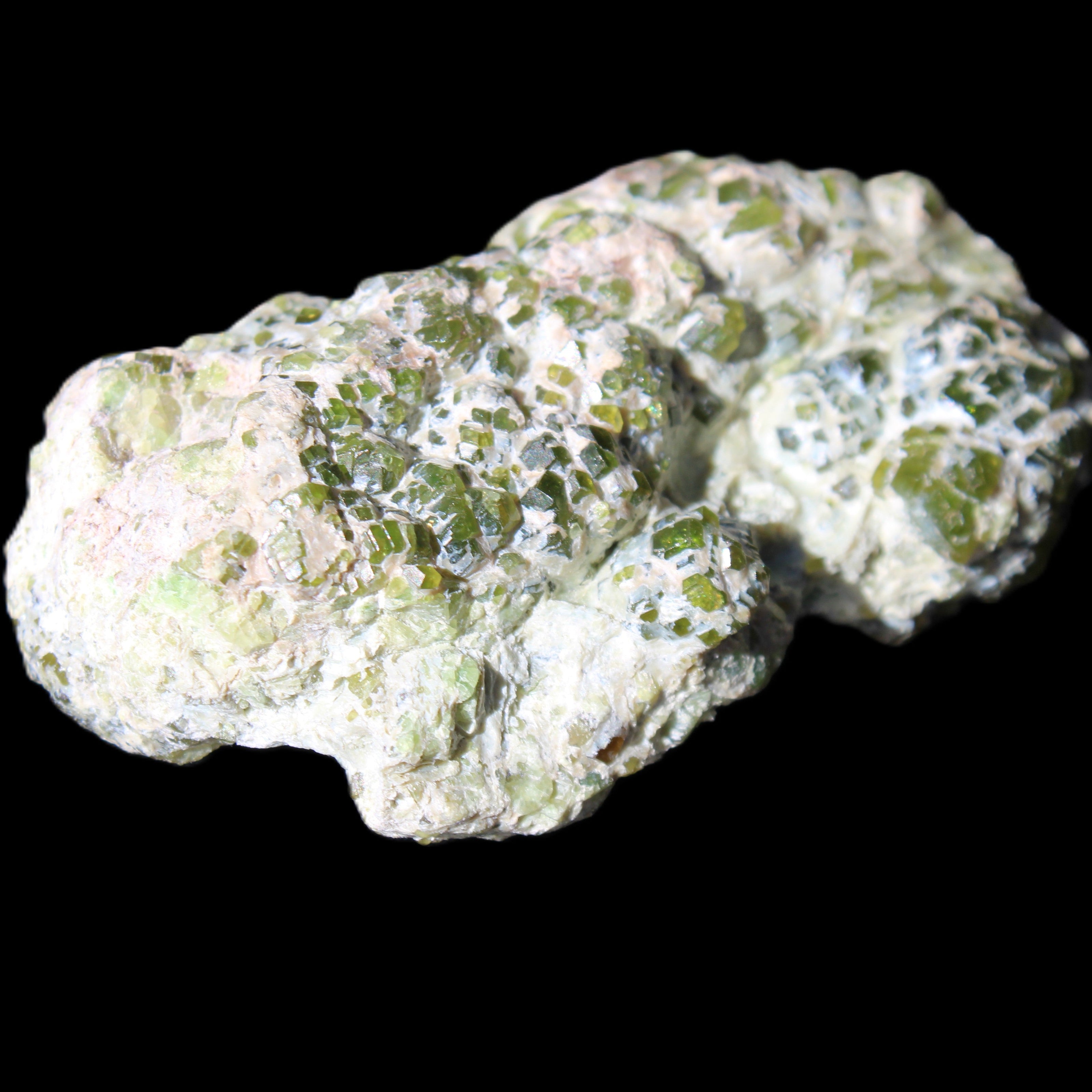 Green Garnet from Pakistan crystal cluster 67*35*25mm 89g in sunlight - Rocks and Things Store