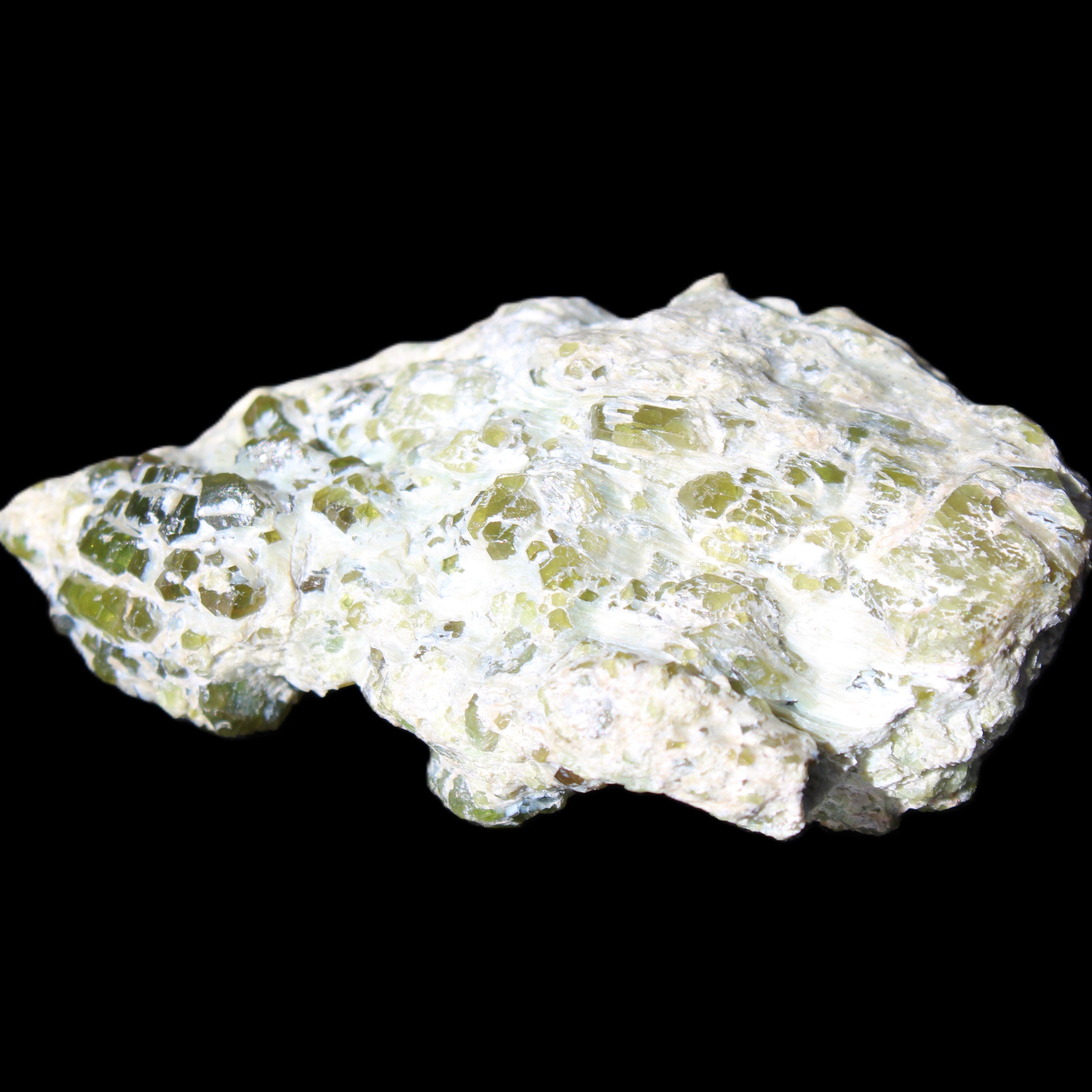 Green Garnet from Pakistan crystal cluster 67*35*25mm 89g in sunlight - Rocks and Things Store