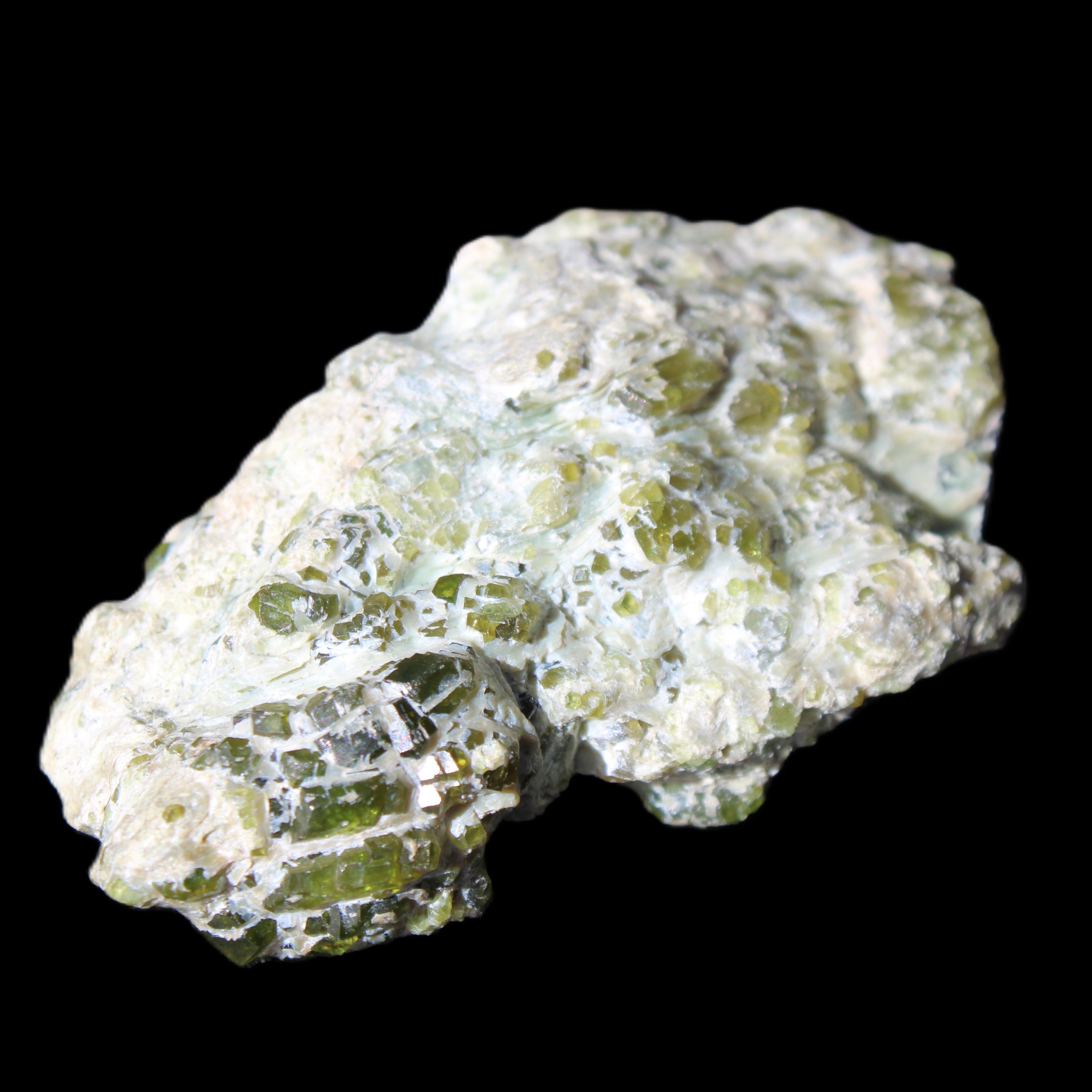 Green Garnet from Pakistan crystal cluster 67*35*25mm 89g in sunlight - Rocks and Things Store