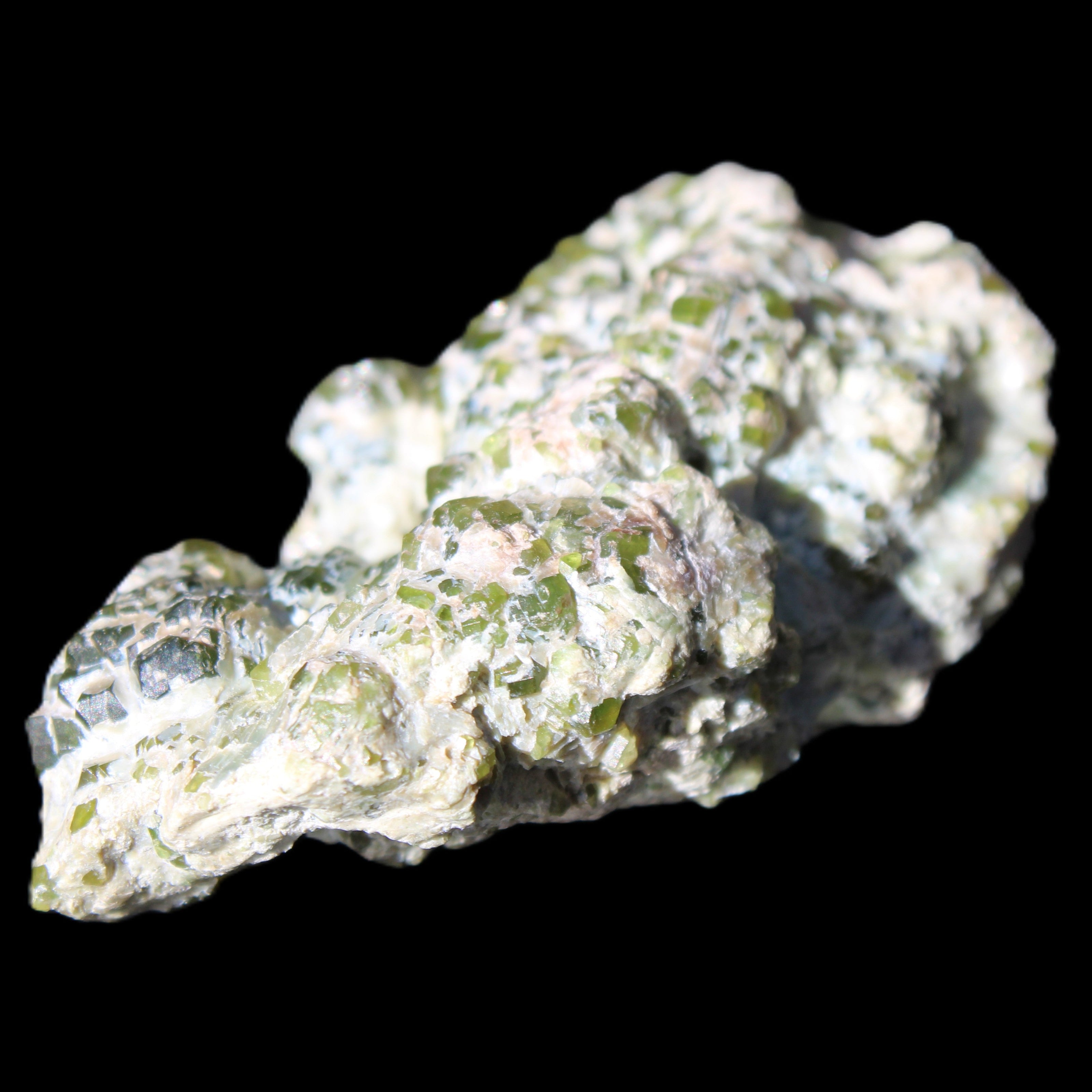 Green Garnet from Pakistan crystal cluster 67*35*25mm 89g in sunlight - Rocks and Things Store