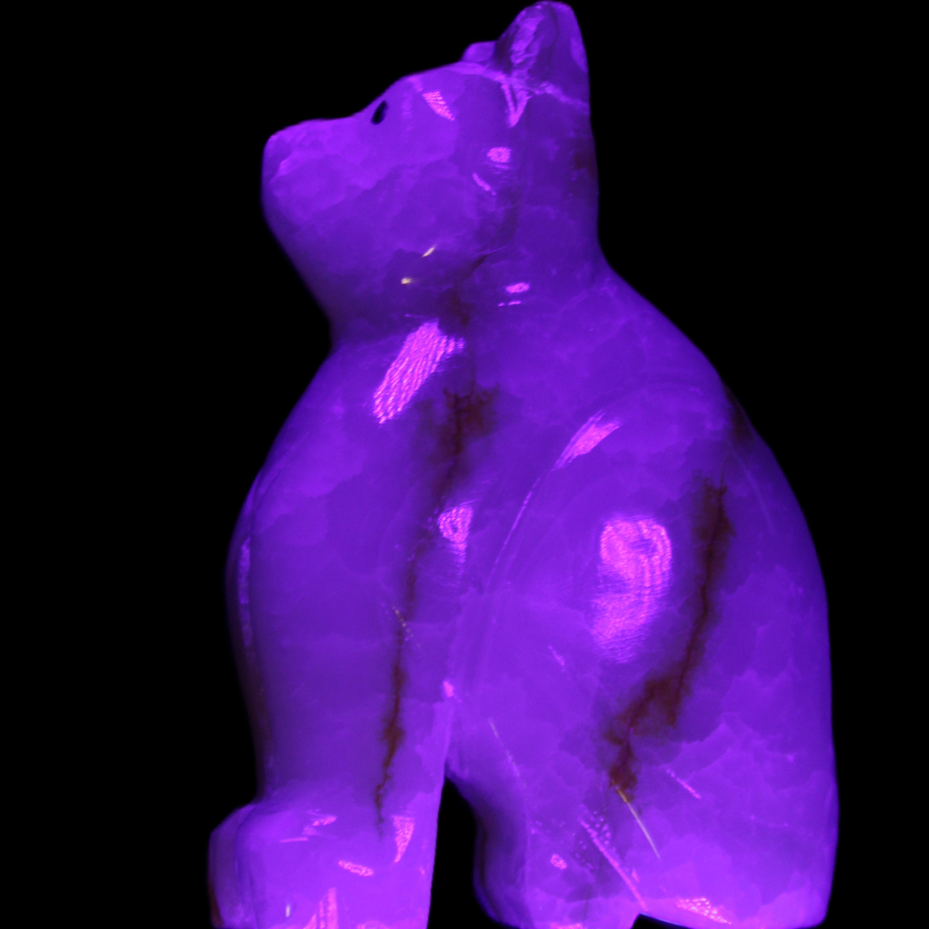 Afghan Jade hand-carved Cat 66*35*98mm 385g in UV light - Rocks and Things Store