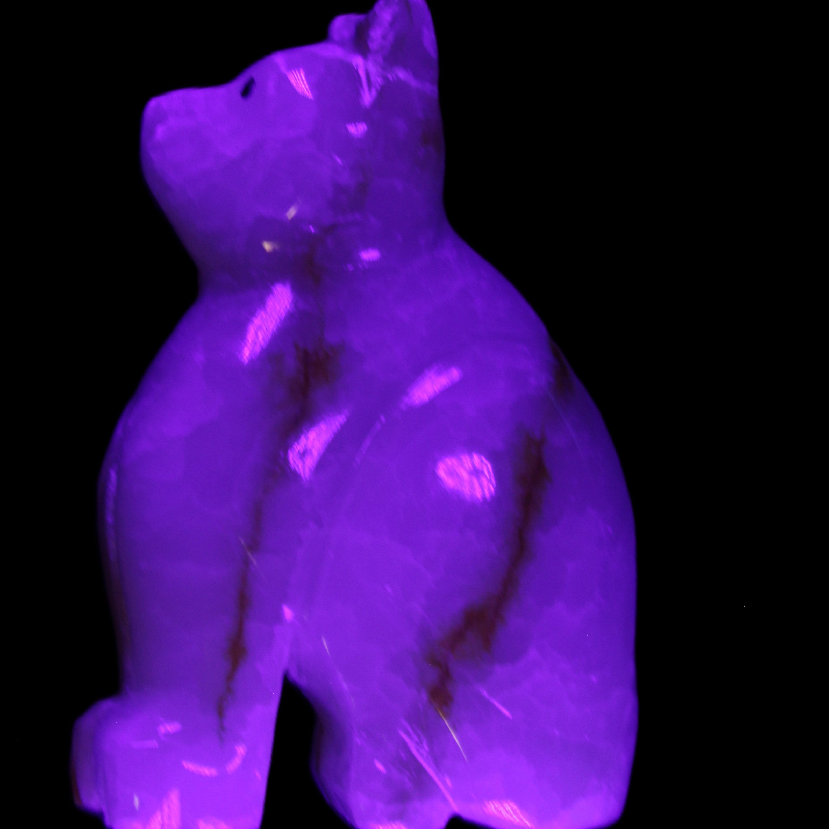 Afghan Jade hand-carved Cat 66*35*98mm 385g in UV light - Rocks and Things Store