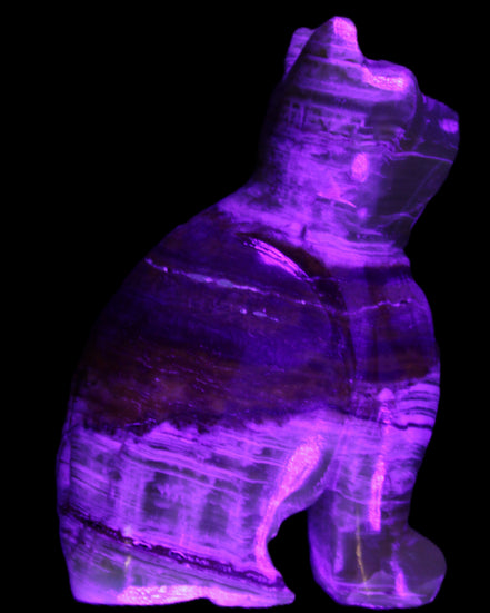Afghan Jade hand-carved Cat 67*31*103mm 354g in UV light - Rocks and Things Store