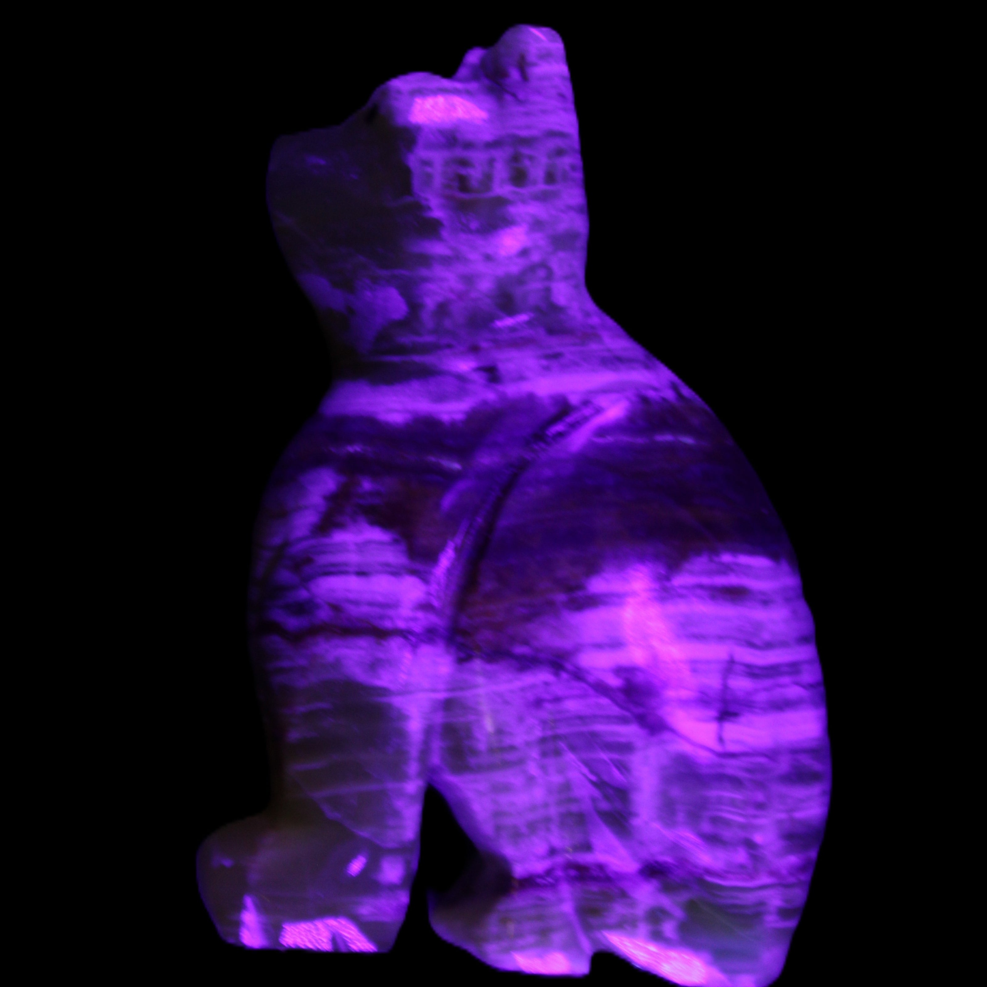 Afghan Jade hand-carved Cat 67*31*103mm 354g in UV light - Rocks and Things Store