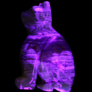 Afghan Jade hand-carved Cat 67*31*103mm 354g in UV light - Rocks and Things Store