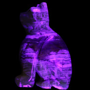 Afghan Jade hand-carved Cat 67*31*103mm 354g in UV light - Rocks and Things Store