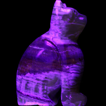 Afghan Jade hand-carved Cat 67*31*103mm 354g in UV light - Rocks and Things Store