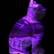 Afghan Jade hand-carved Cat 67*31*103mm 354g in UV light - Rocks and Things Store