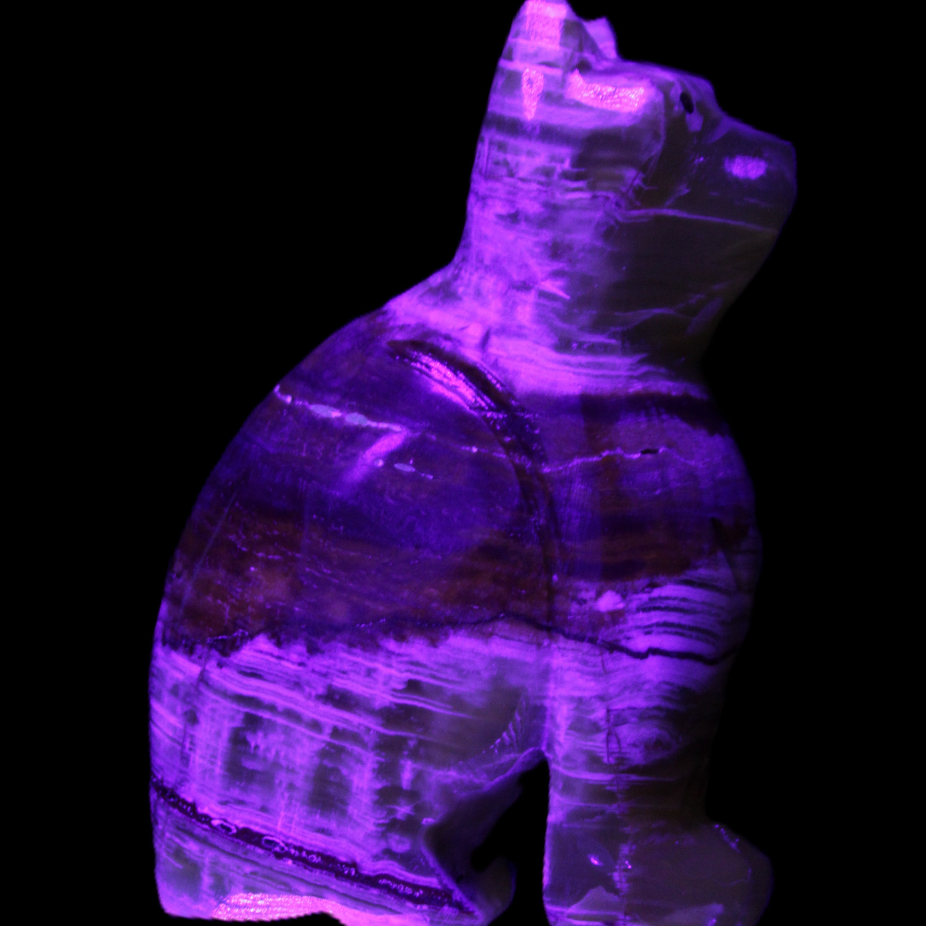 Afghan Jade hand-carved Cat 67*31*103mm 354g in UV light - Rocks and Things Store