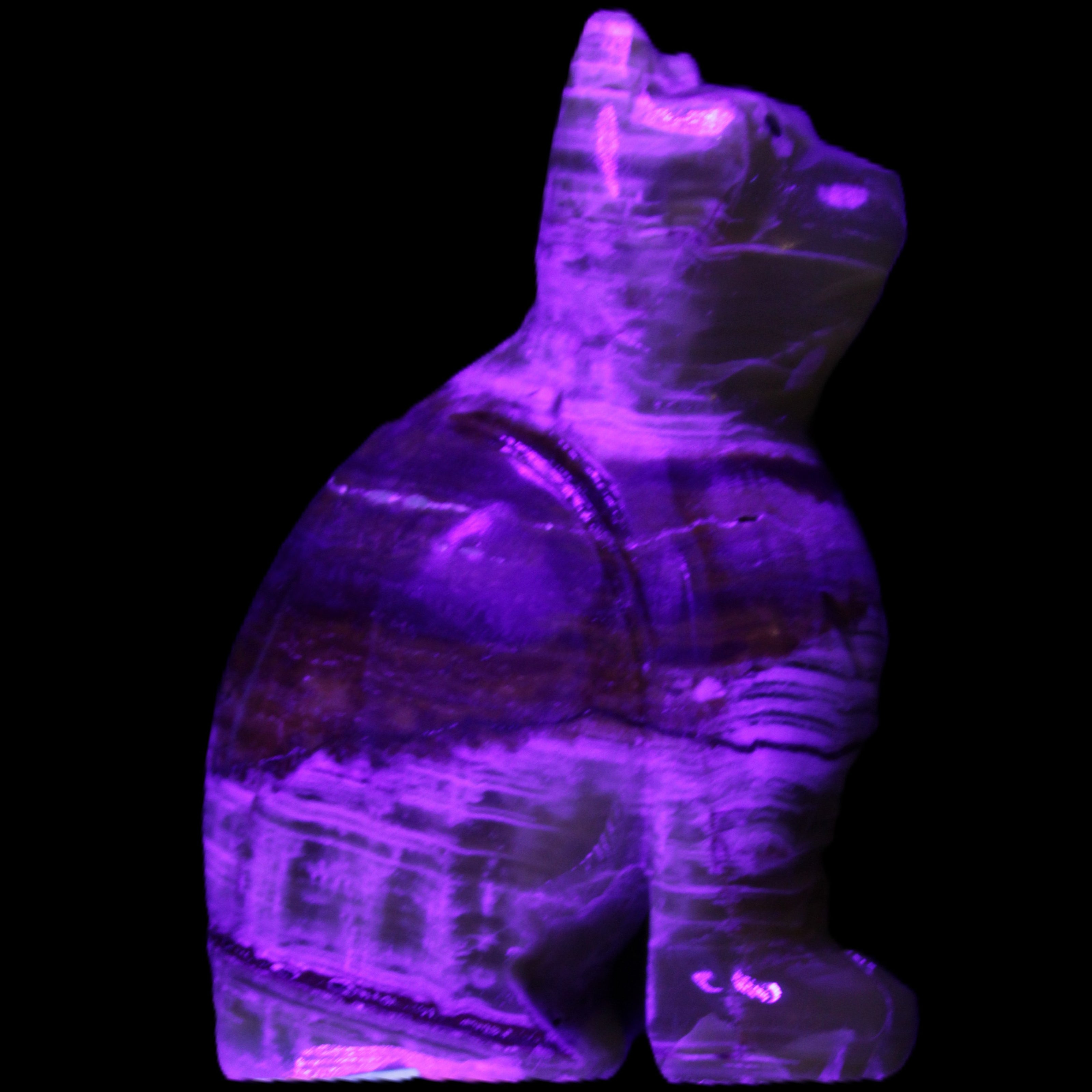 Afghan Jade hand-carved Cat 67*31*103mm 354g in UV light - Rocks and Things Store