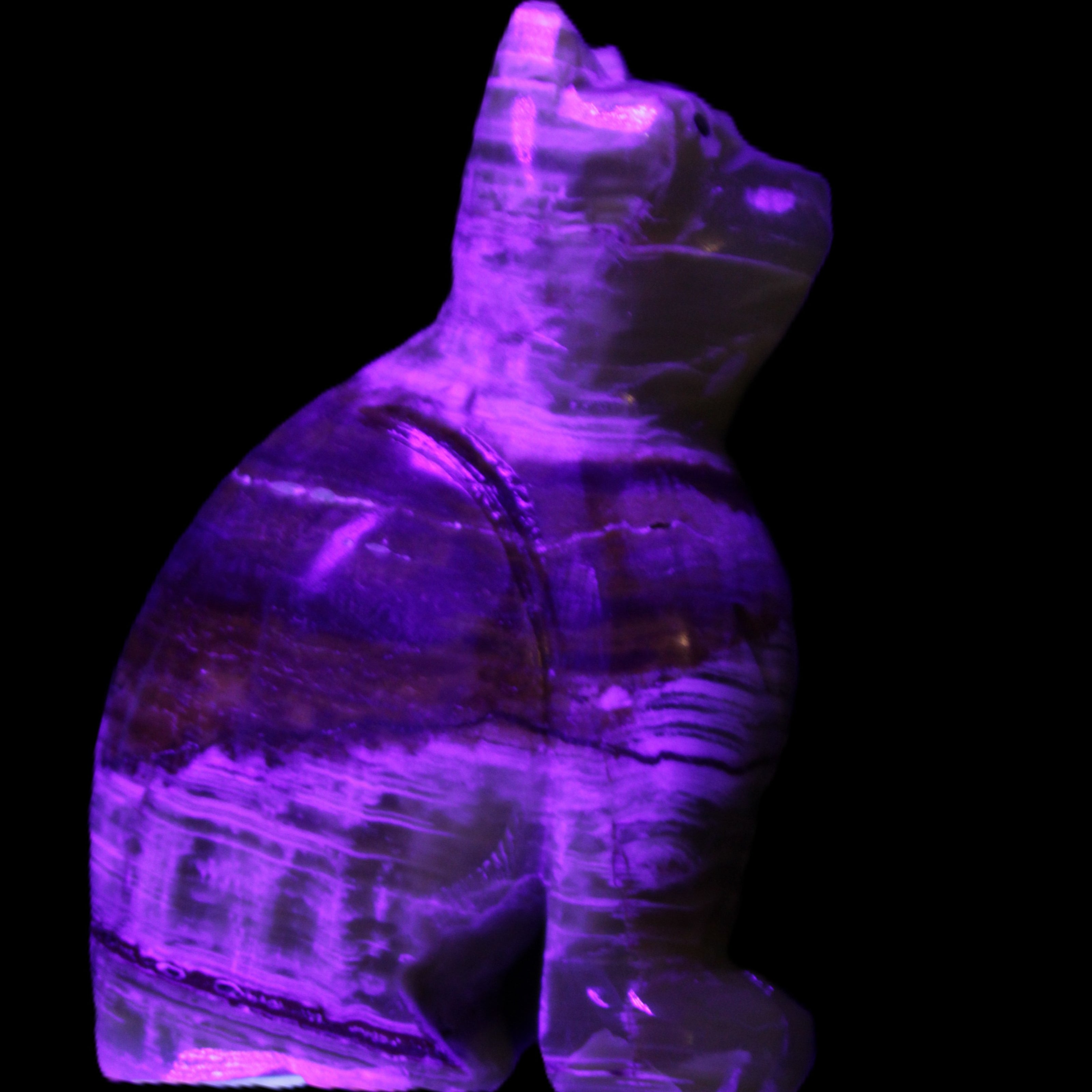 Afghan Jade hand-carved Cat 67*31*103mm 354g in UV light - Rocks and Things Store