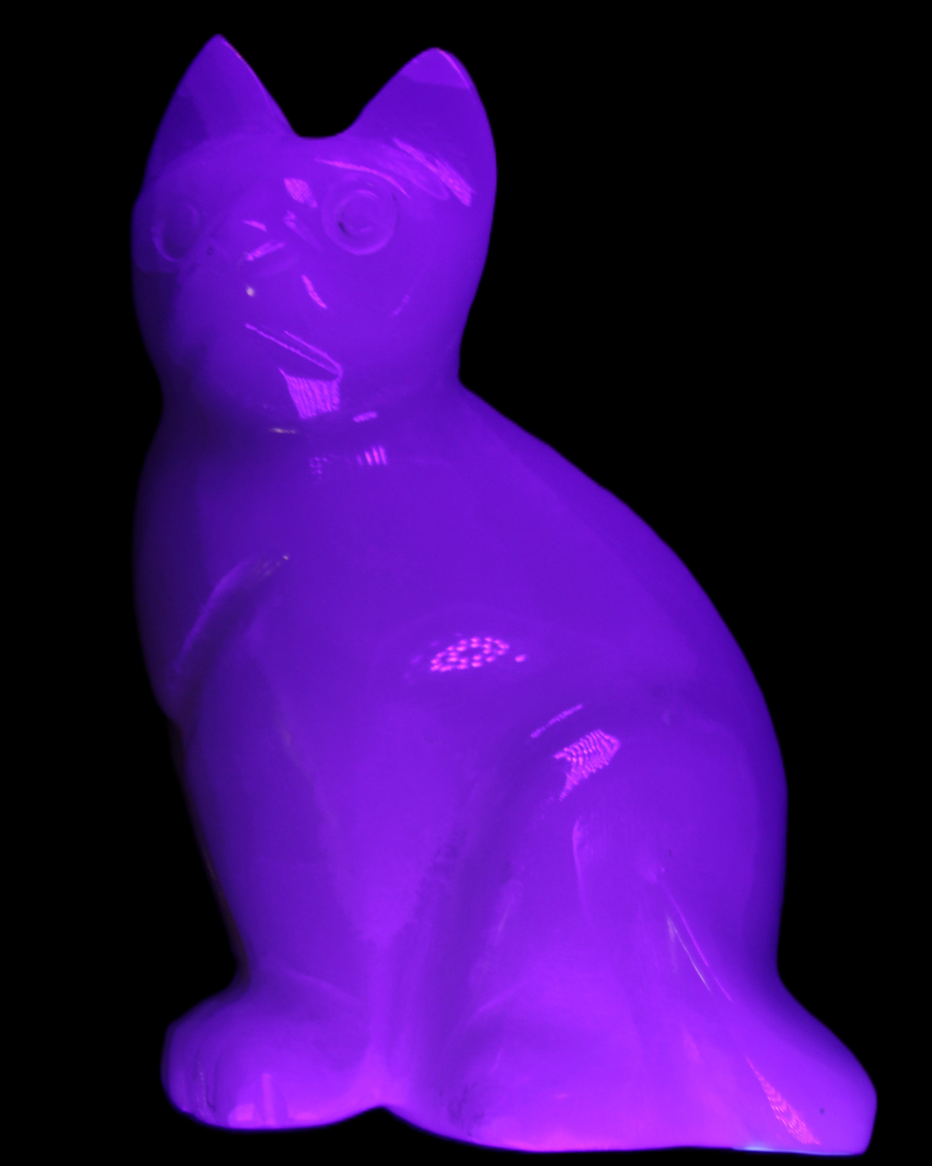 White Onyx Afghan Jade hand-carved Cat 87*48*138mm 773g in UV light - Rocks and Things Store