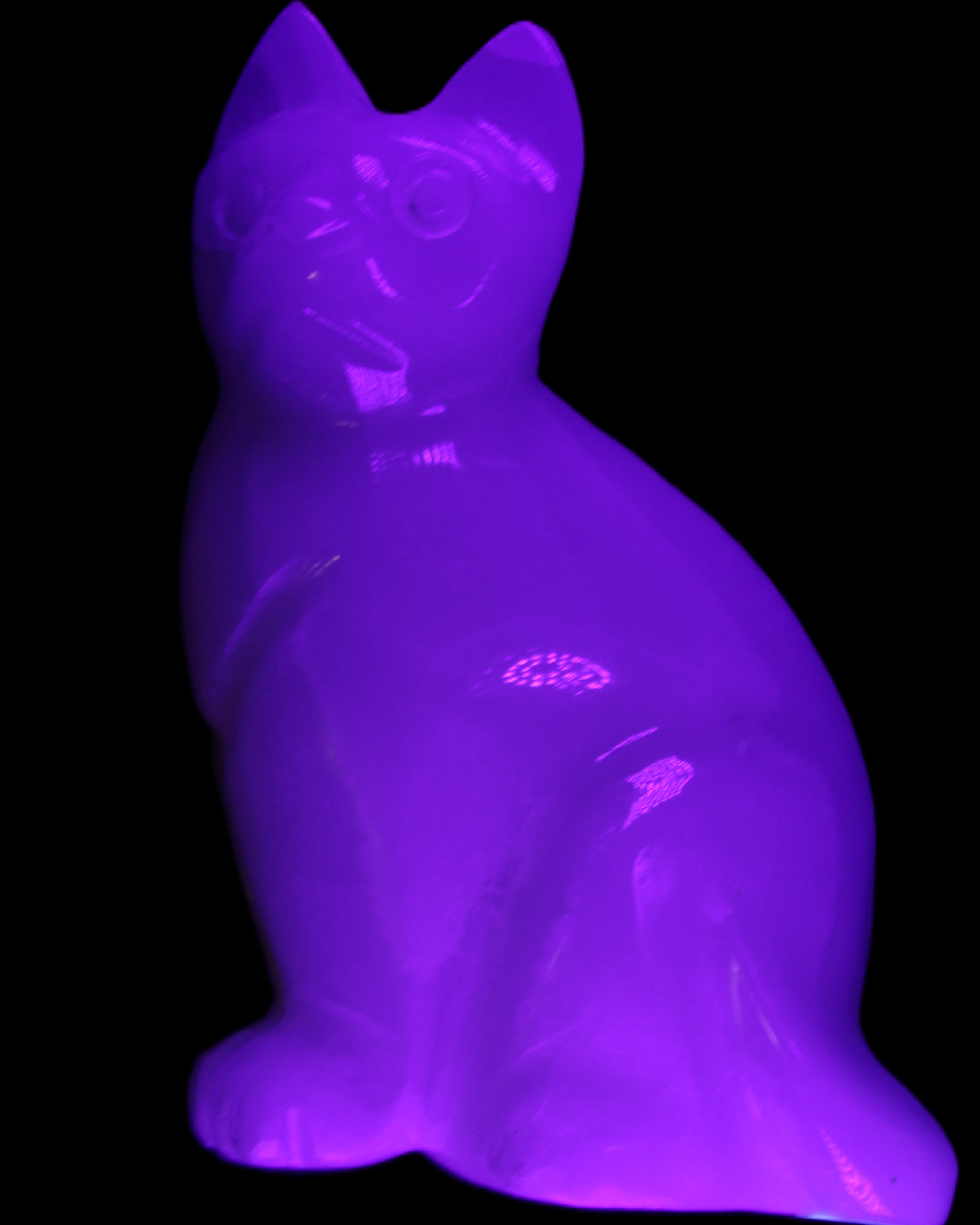 White Onyx Afghan Jade hand-carved Cat 87*48*138mm 773g in UV light - Rocks and Things Store
