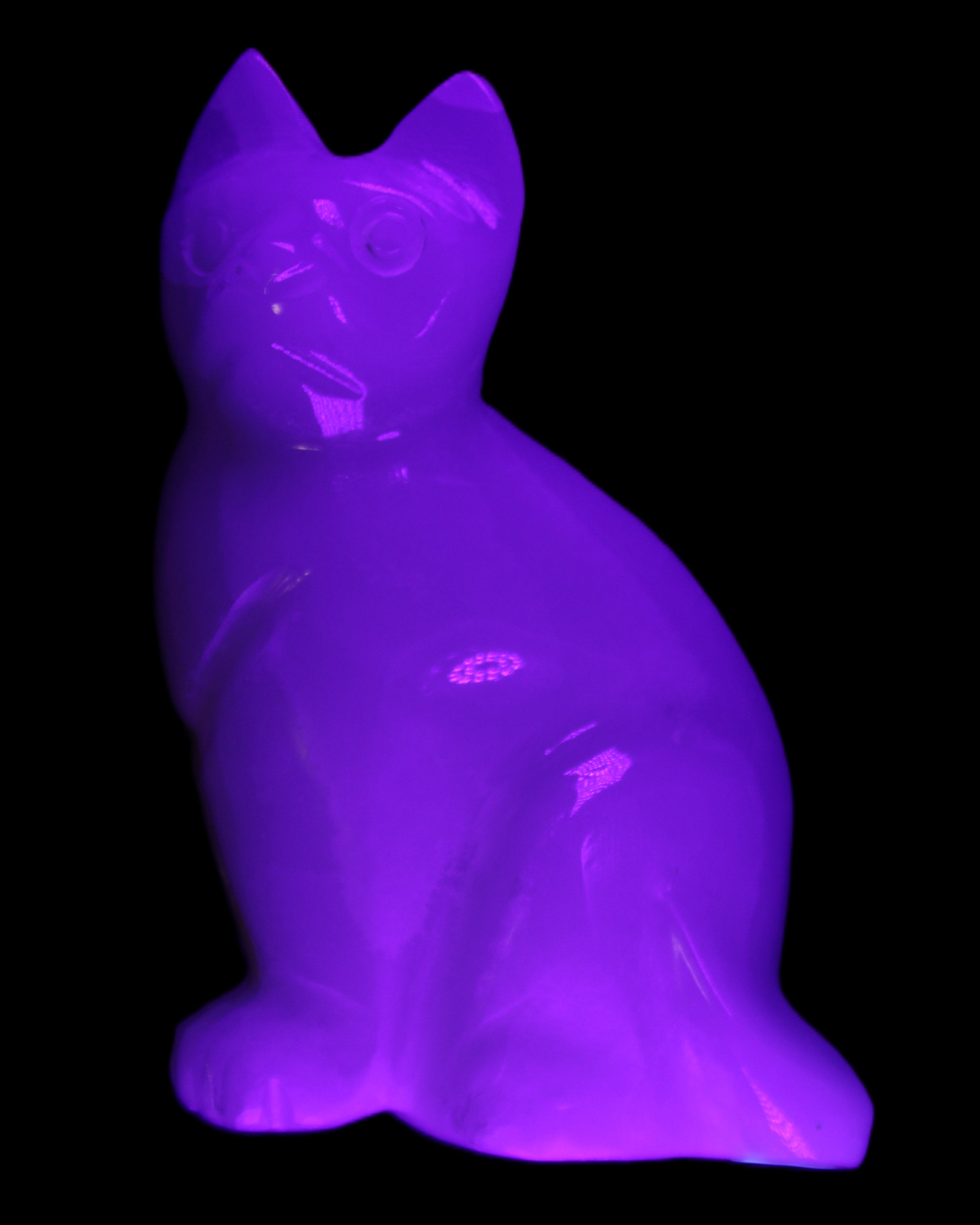White Onyx Afghan Jade hand-carved Cat 87*48*138mm 773g in UV light - Rocks and Things Store