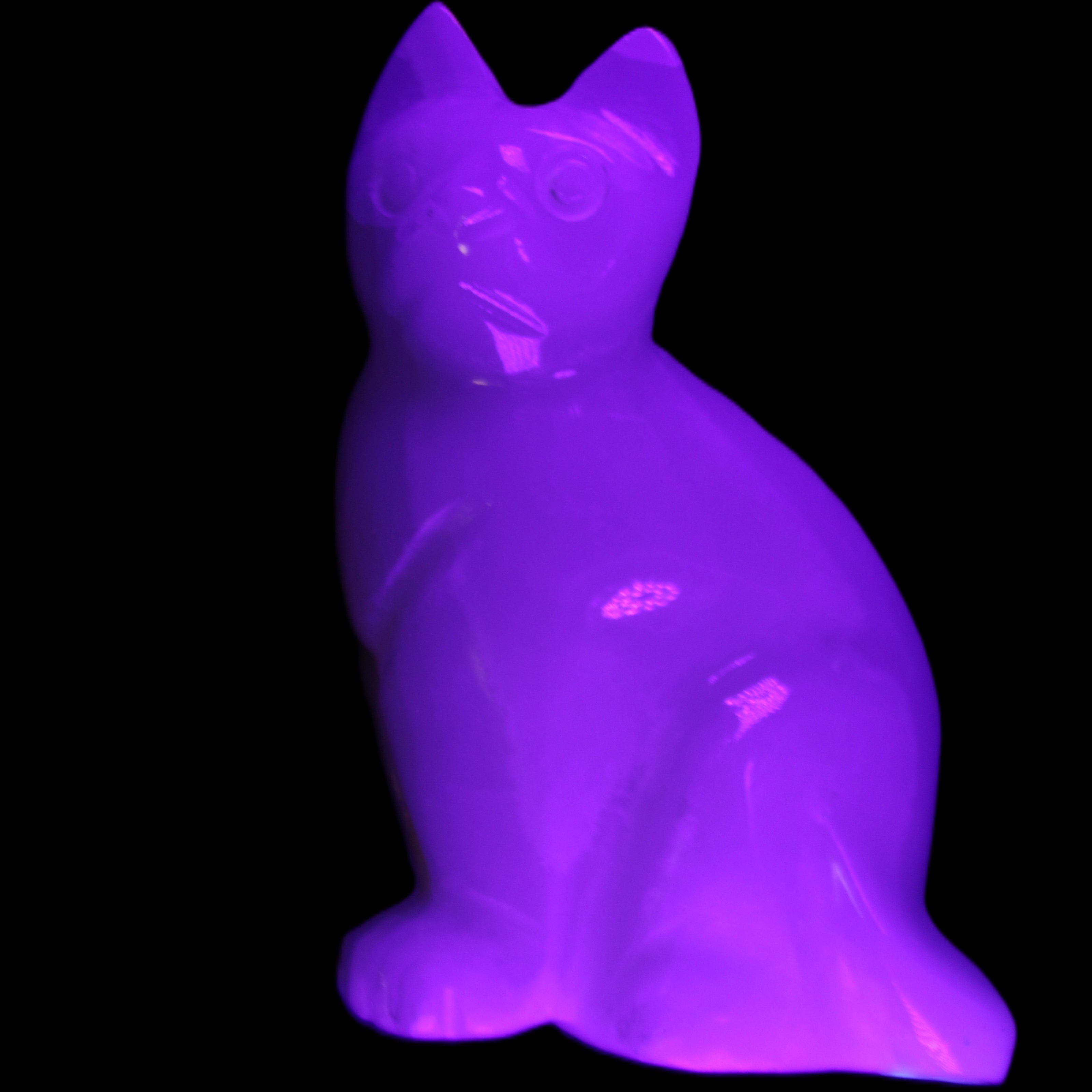 White Onyx Afghan Jade hand-carved Cat 87*48*138mm 773g in UV light - Rocks and Things Store