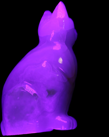 White Onyx Afghan Jade hand-carved Cat 87*48*138mm 773g in UV light - Rocks and Things Store