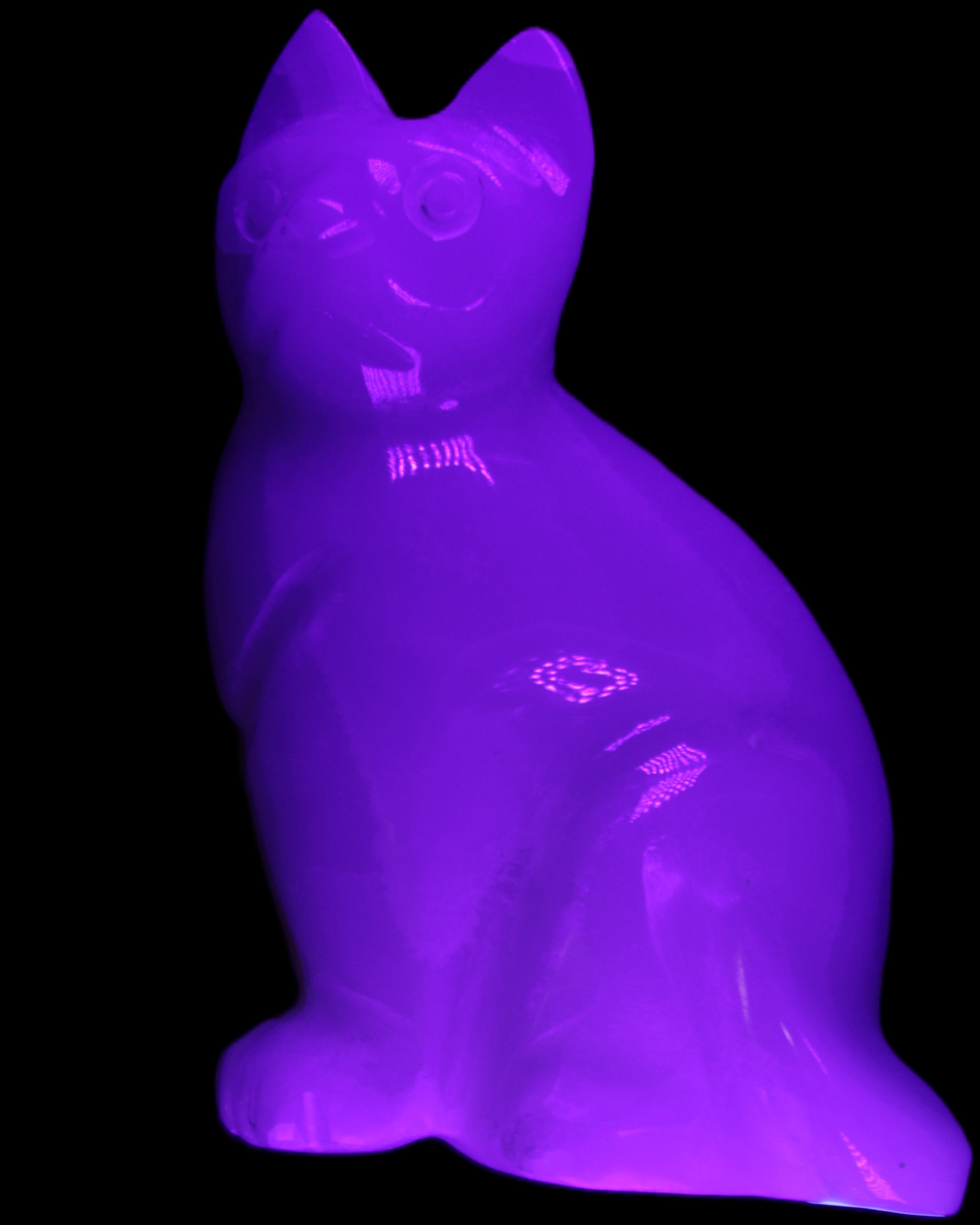 White Onyx Afghan Jade hand-carved Cat 87*48*138mm 773g in UV light - Rocks and Things Store