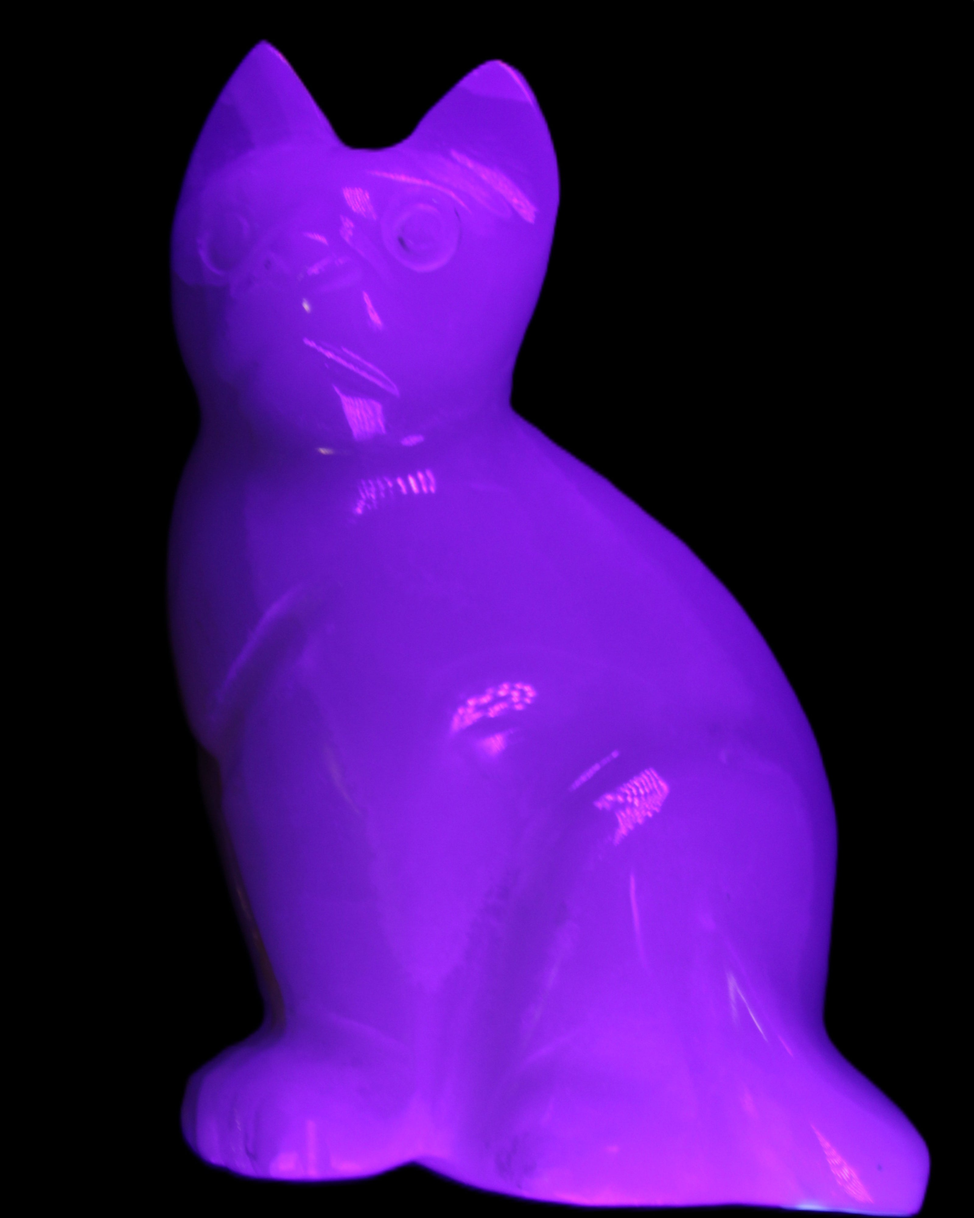 White Onyx Afghan Jade hand-carved Cat 87*48*138mm 773g in UV light - Rocks and Things Store