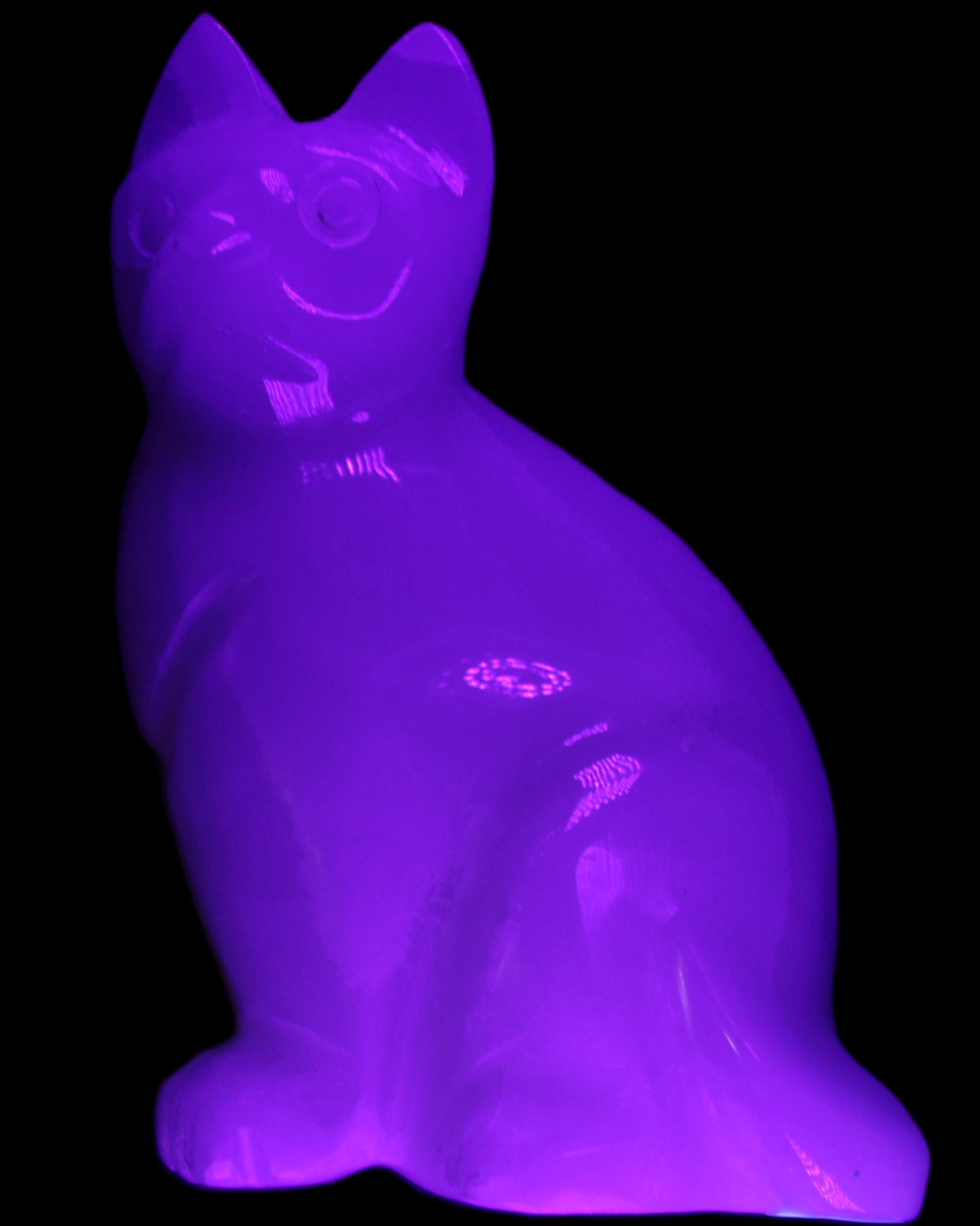 White Onyx Afghan Jade hand-carved Cat 87*48*138mm 773g in UV light - Rocks and Things Store