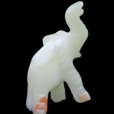 Afghan Jade hand-carved Elephant 65*29*111mm 225g in sunlight - Rocks and Things Store