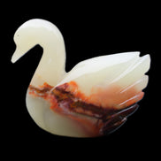 Afghan Jade hand-carved Swan 103*32*85mm 328g in sunlight - Rocks and Things Store