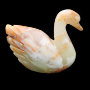 Afghan Jade hand-carved Swan 103*31*86mm 317g in sunlight - Rocks and Things Store