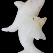 Afghan Jade hand-carved leaping Dolphin pair 78*37*105mm 256g in sunlight - Rocks and Things Store