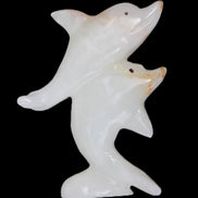 Afghan Jade hand-carved leaping Dolphin pair 78*37*105mm 256g in sunlight - Rocks and Things Store