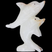 Afghan Jade hand-carved leaping Dolphin pair 78*37*105mm 256g in sunlight - Rocks and Things Store