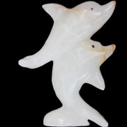 Afghan Jade hand-carved leaping Dolphin pair 78*37*105mm 256g in sunlight - Rocks and Things Store