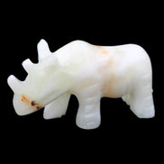 Afghan Jade hand-carved Rhino 100*29*59mm 232g in sunlight - Rocks and Things Store