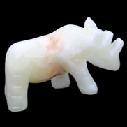 Afghan Jade hand-carved Rhino 100*29*59mm 232g in sunlight - Rocks and Things Store