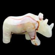 Afghan Jade hand-carved Rhino 98*29*58mm 246g in sunlight - Rocks and Things Store