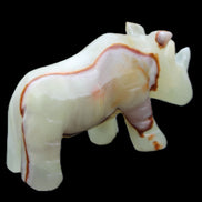Afghan Jade hand-carved Rhino 98*29*58mm 246g in sunlight - Rocks and Things Store