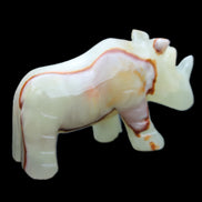 Afghan Jade hand-carved Rhino 98*29*58mm 246g in sunlight - Rocks and Things Store