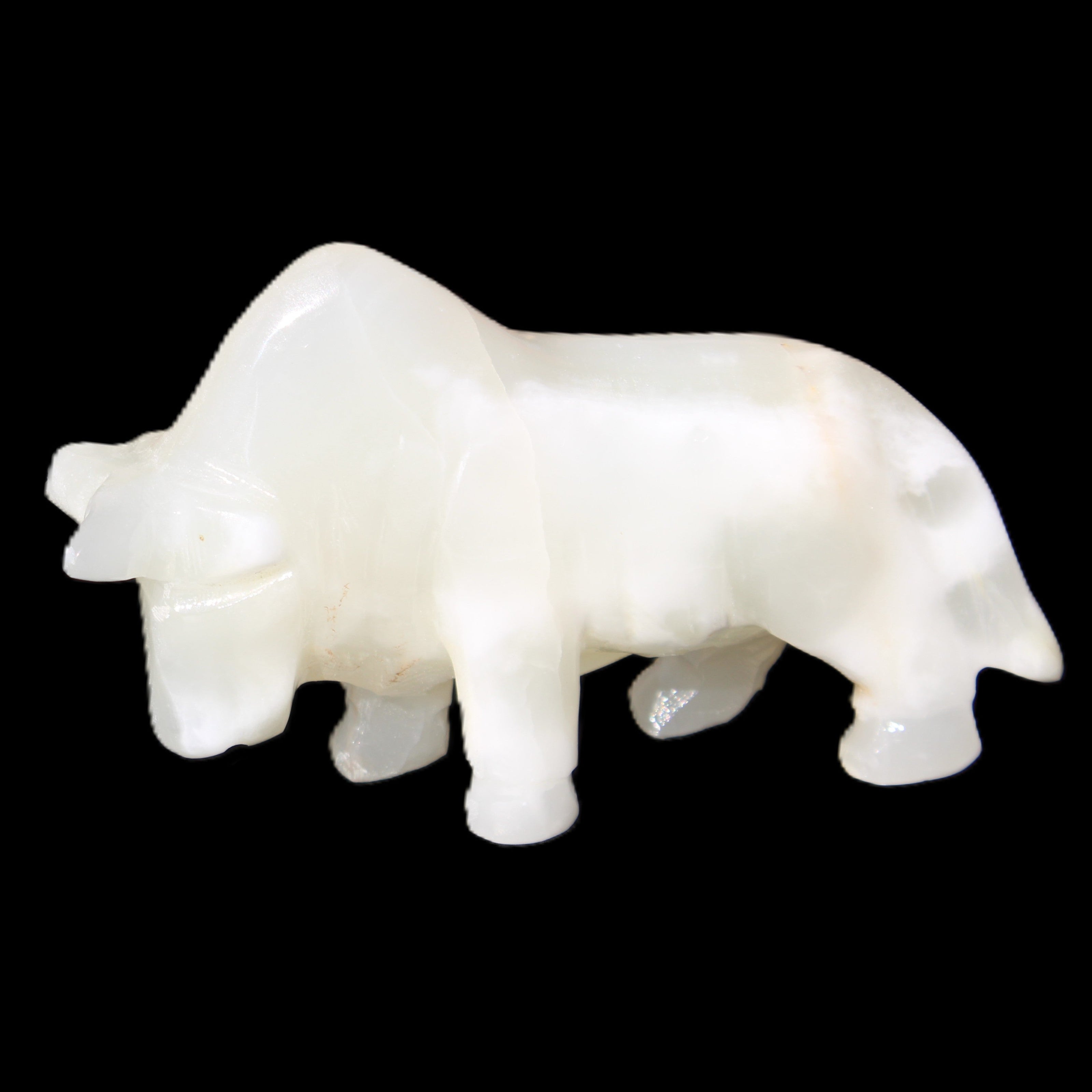 Afghan Jade hand-carved Bull 115*30*67mm 234g in sunlight - Rocks and Things Store