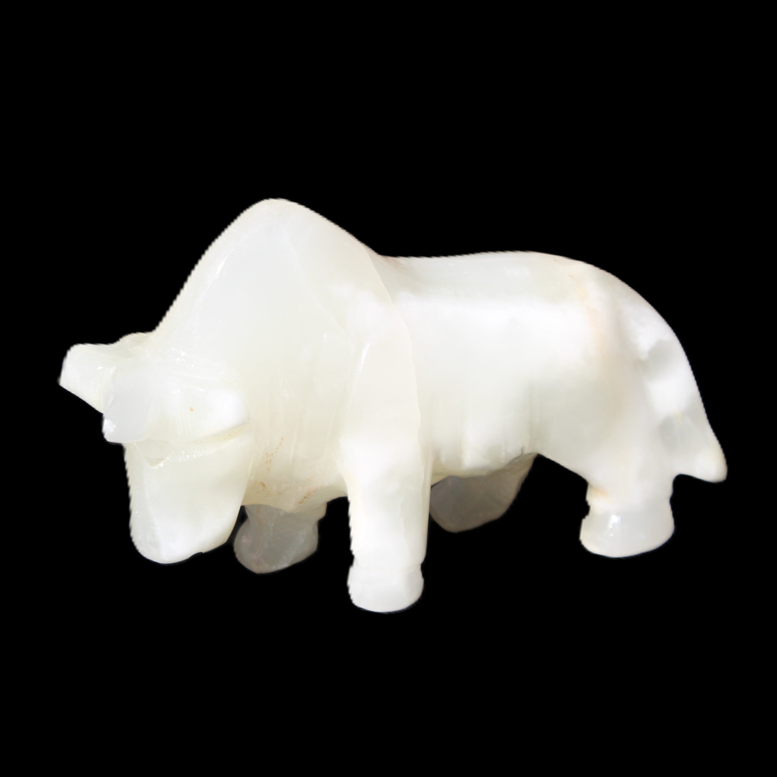 Afghan Jade hand-carved Bull 115*30*67mm 234g in sunlight - Rocks and Things Store