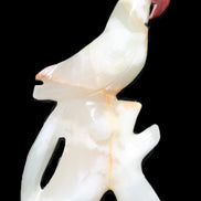 Afghan Jade hand-carved Bird 81*33*130mm 338g in sunlight - Rocks and Things Store