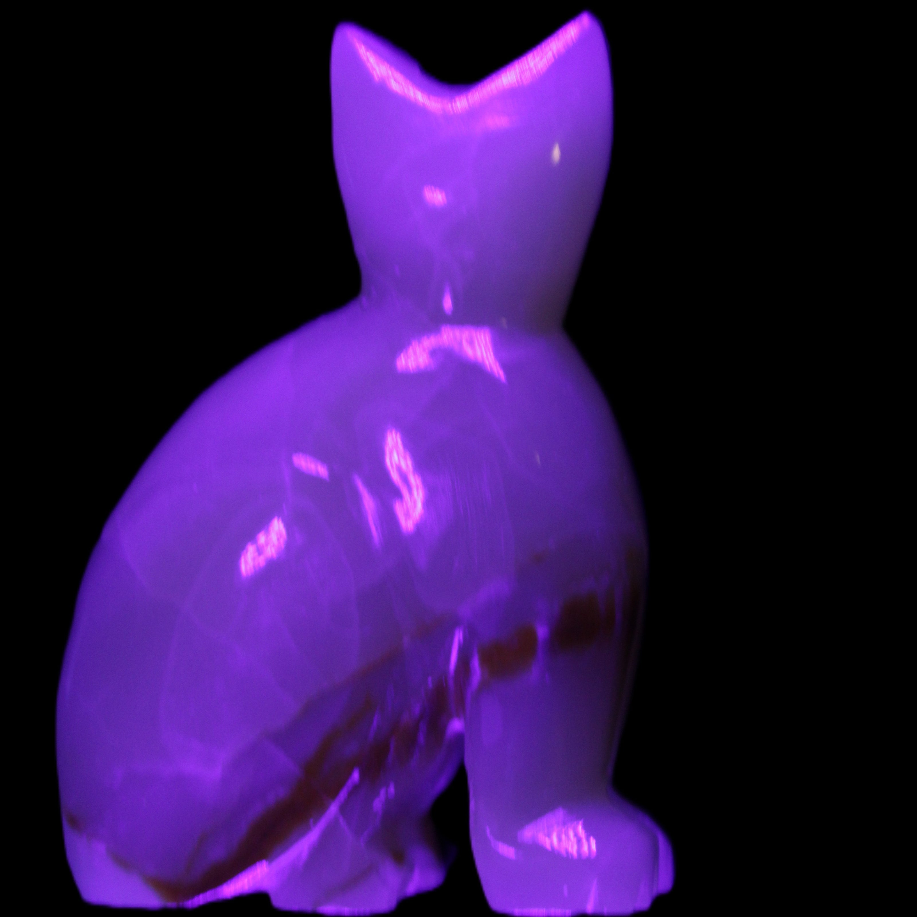 Afghan Jade hand-carved Cat 75*33*108mm 413g in UV light - Rocks and Things Store