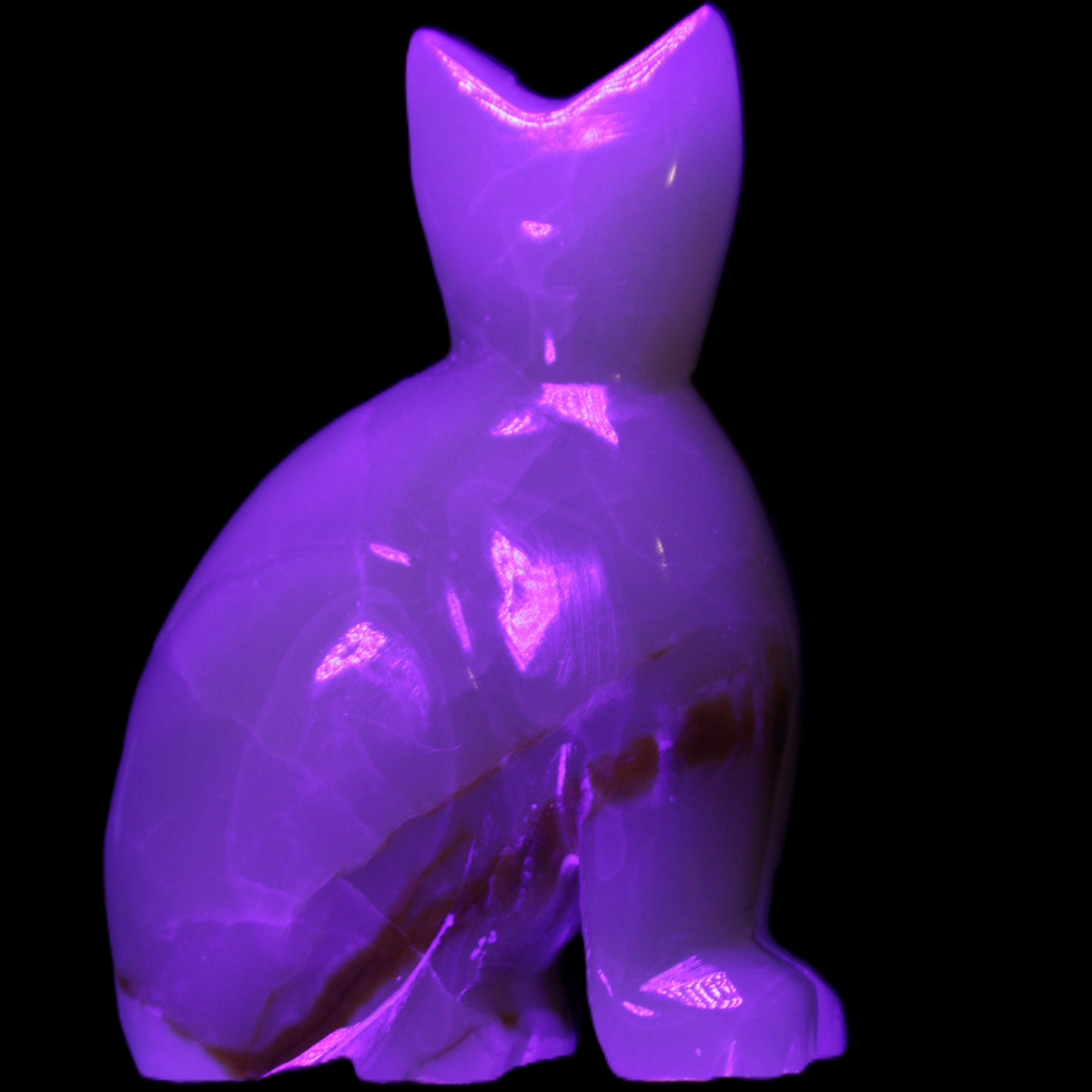 Afghan Jade hand-carved Cat 75*33*108mm 413g in UV light - Rocks and Things Store