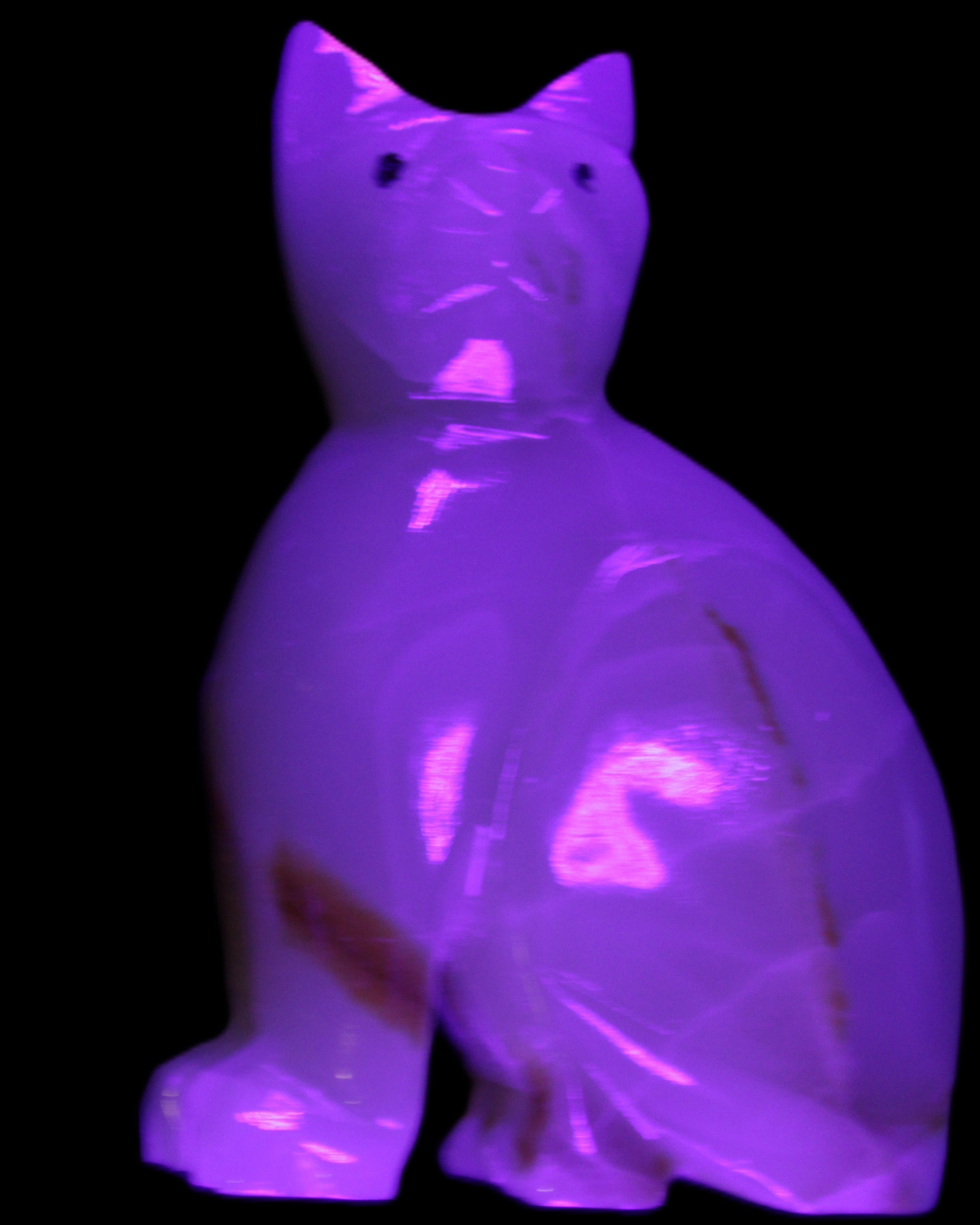 Afghan Jade hand-carved Cat 75*33*108mm 413g in UV light - Rocks and Things Store