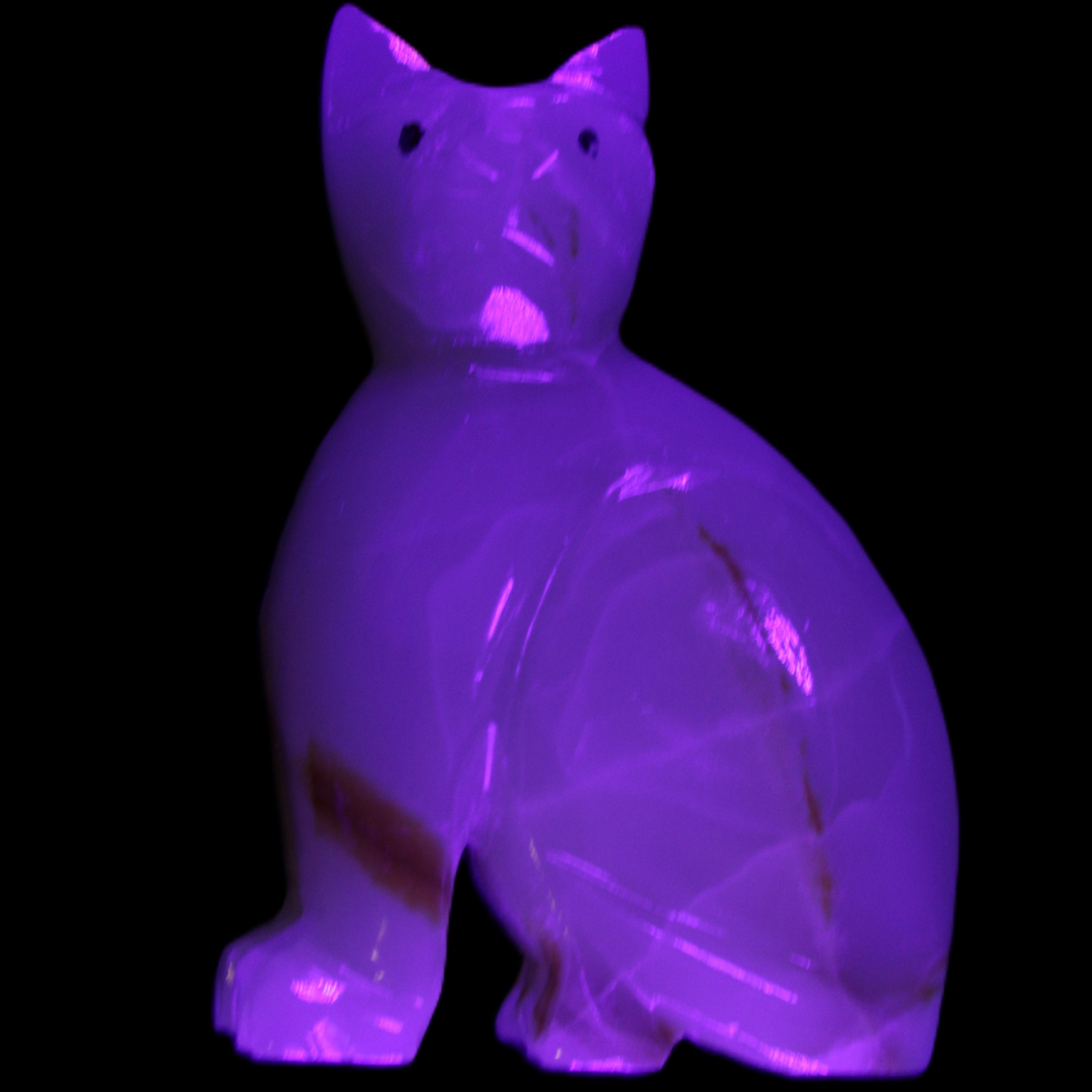 Afghan Jade hand-carved Cat 75*33*108mm 413g in UV light - Rocks and Things Store