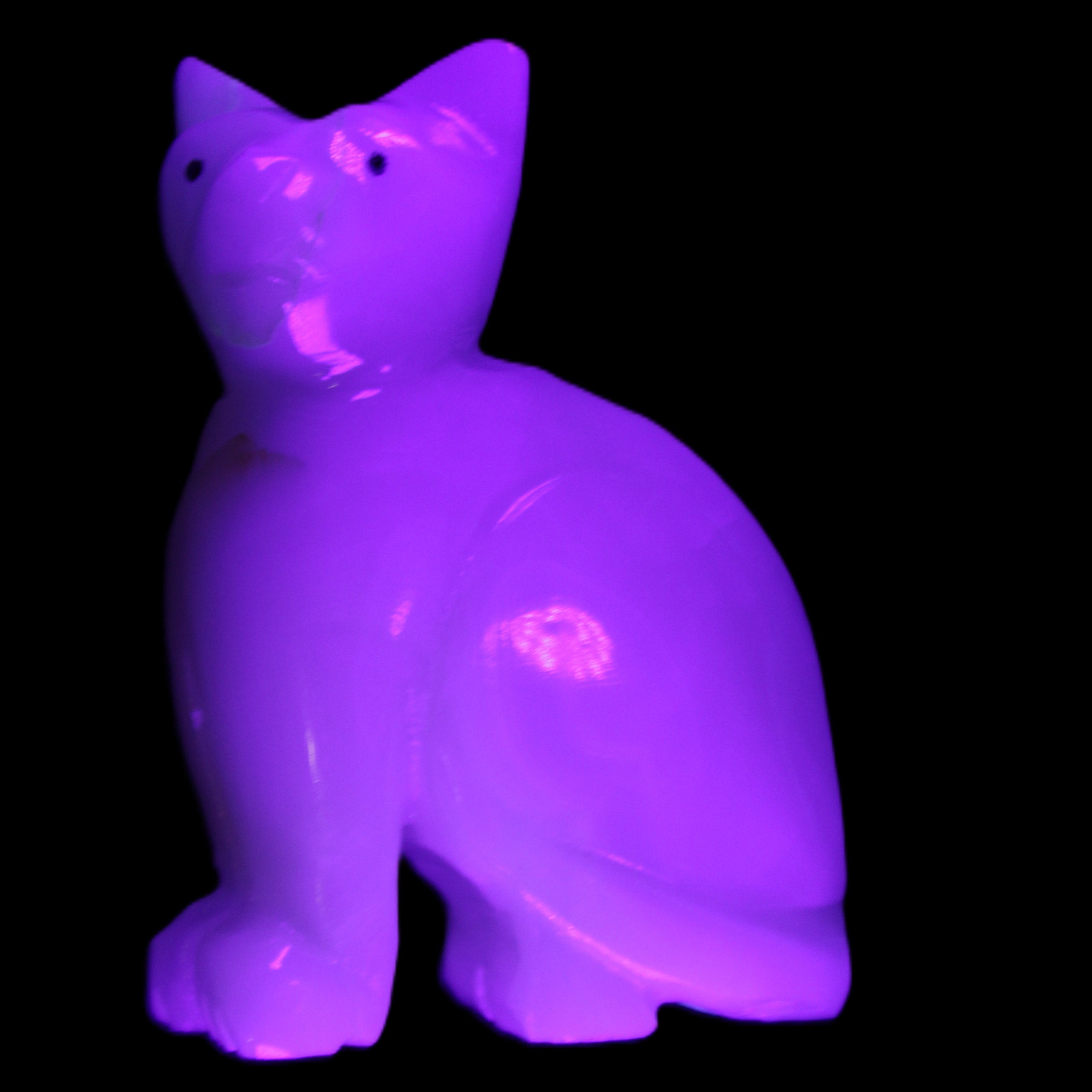 Afghan Jade hand-carved Cat 70*34*102mm 388g in UV light - Rocks and Things Store