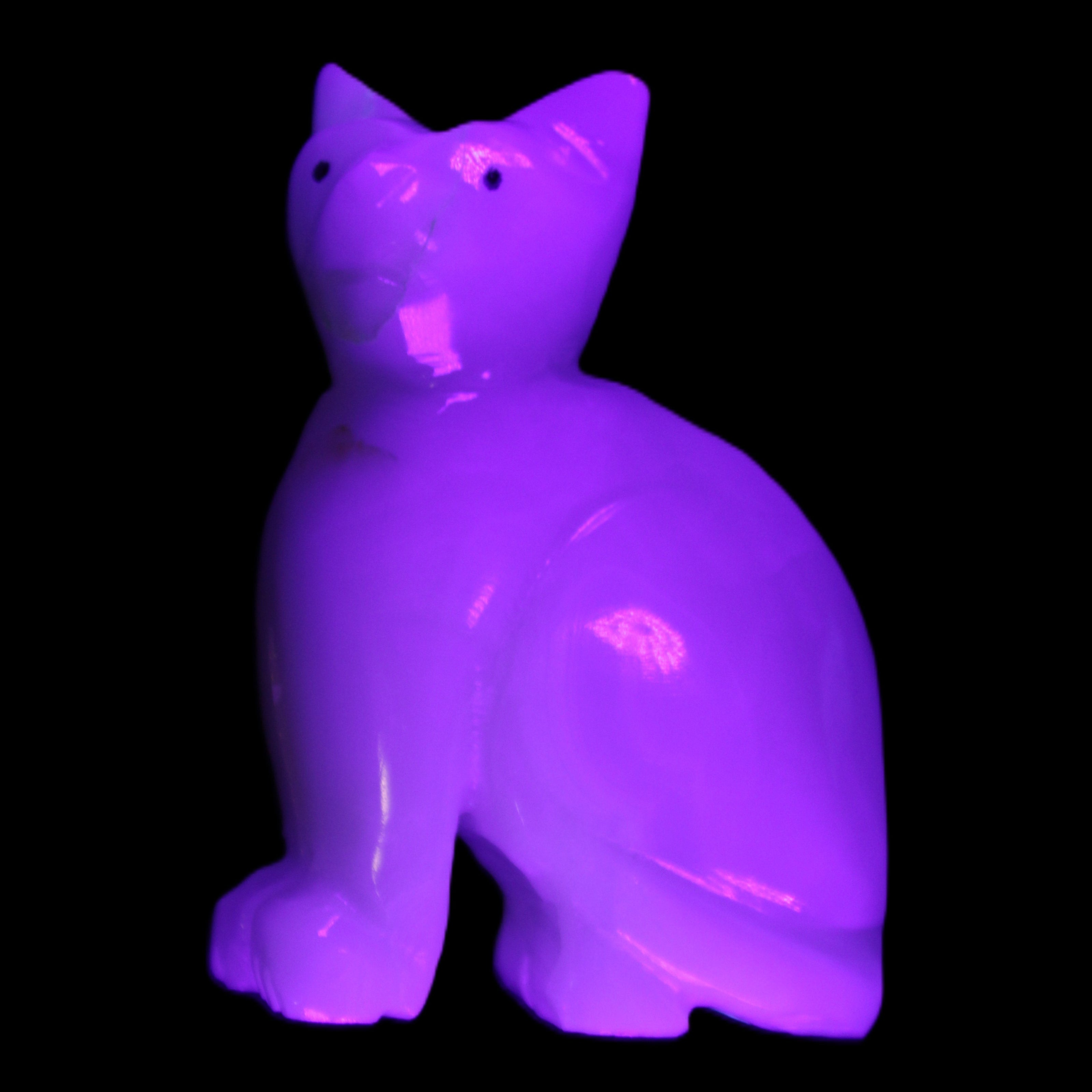 Afghan Jade hand-carved Cat 70*34*102mm 388g in UV light - Rocks and Things Store