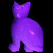 Afghan Jade hand-carved Cat 70*34*102mm 388g in UV light - Rocks and Things Store