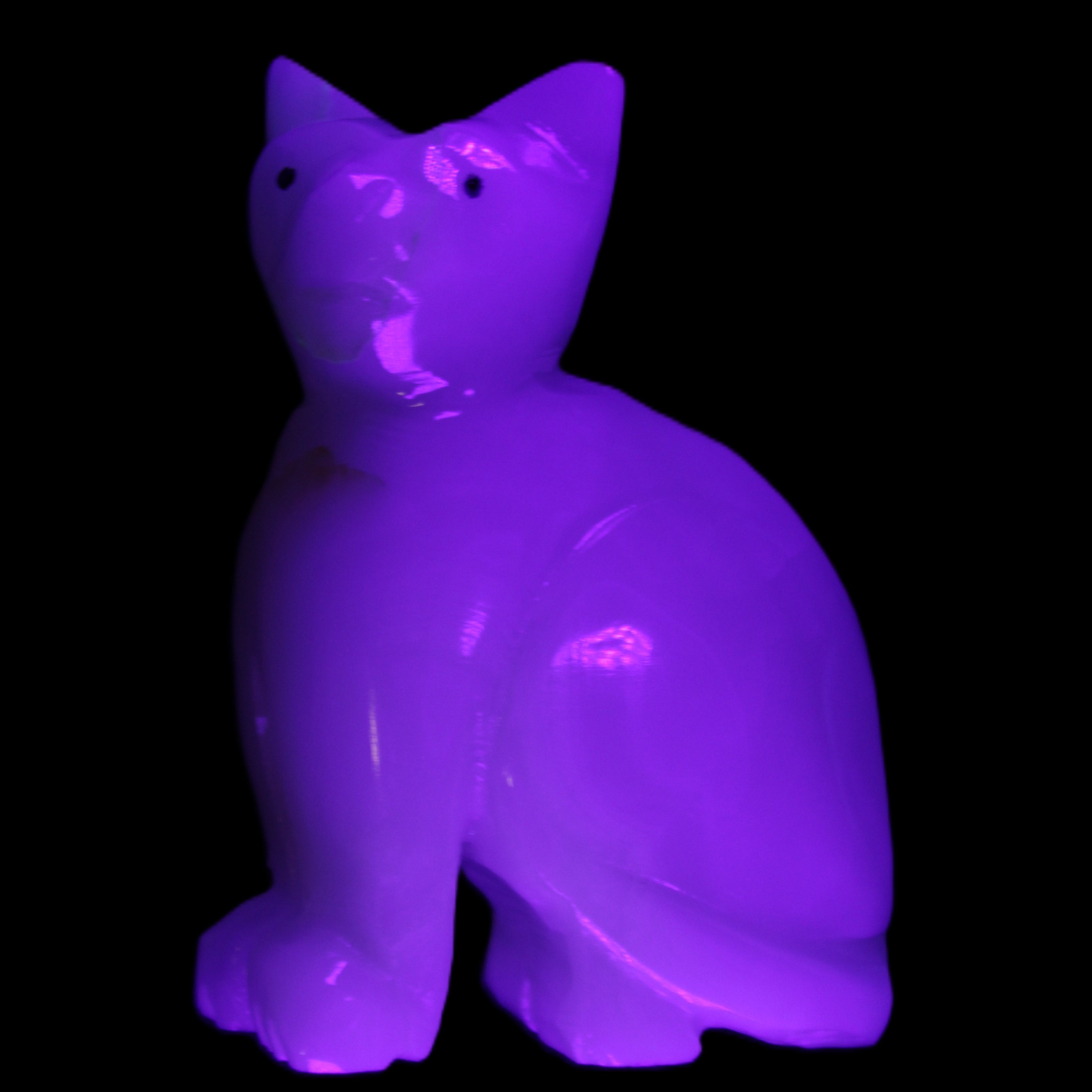 Afghan Jade hand-carved Cat 70*34*102mm 388g in UV light - Rocks and Things Store