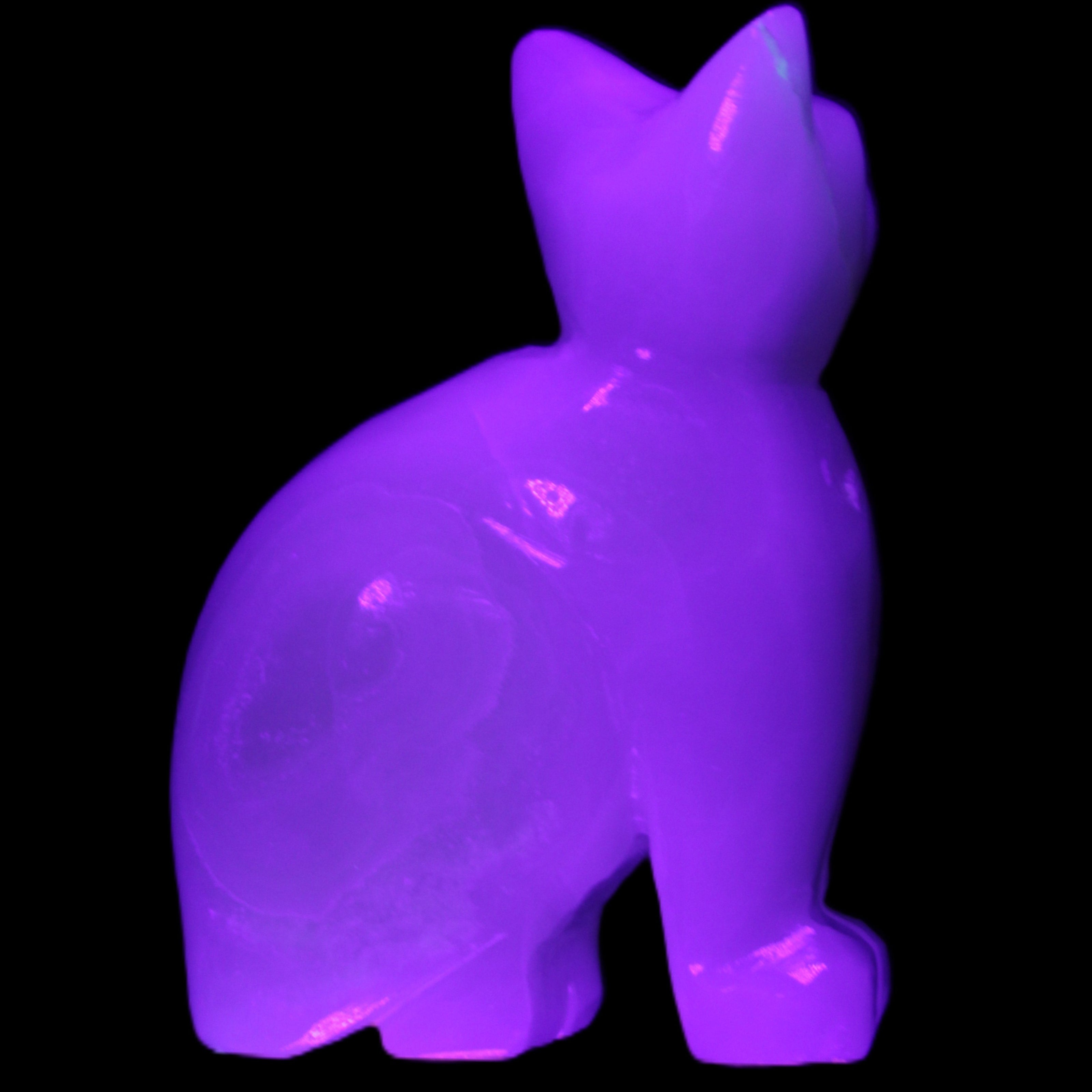Afghan Jade hand-carved Cat 70*34*102mm 388g in UV light - Rocks and Things Store