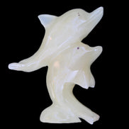 Afghan Jade hand-carved leaping Dolphin pair 82*42*107mm 296g in sunlight - Rocks and Things Store