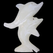 Afghan Jade hand-carved leaping Dolphin pair 76*35*105mm 252g in sunlight - Rocks and Things Store