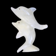 Afghan Jade hand-carved leaping Dolphin pair 76*35*105mm 252g in sunlight - Rocks and Things Store